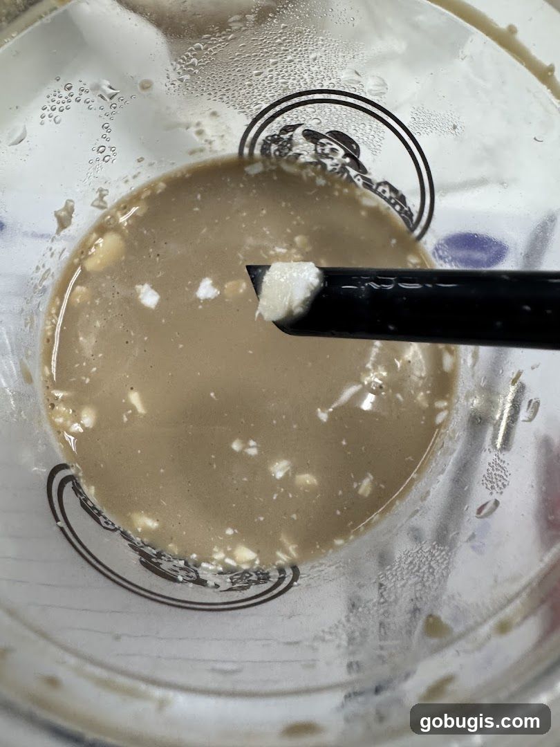 Close-up of a drink with a straw