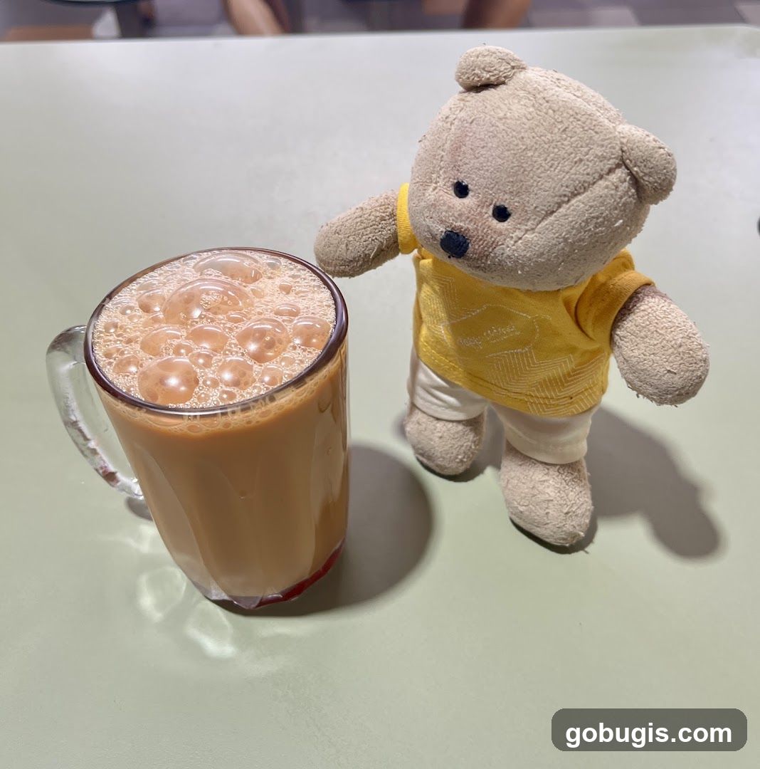 Teddy bear with a drink
