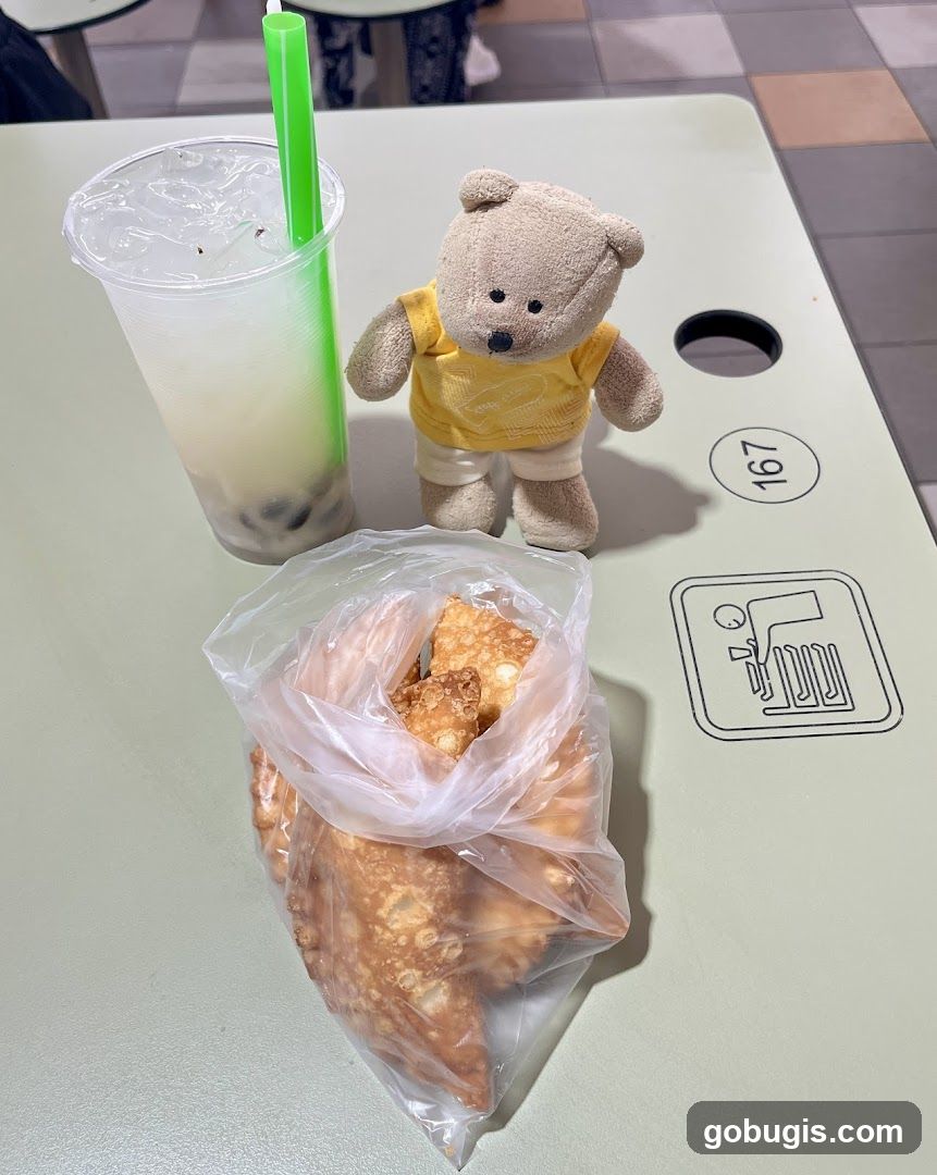 Teddy Bear with Bubble Tea and Fried Pastries