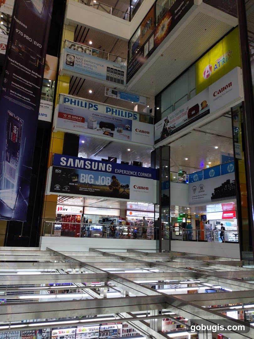Mall Interior with Electronics Advertisements