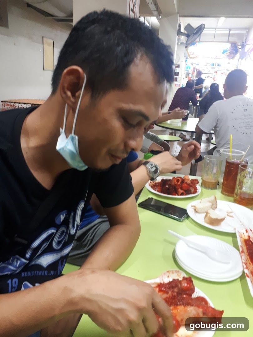 People eating at a food stall