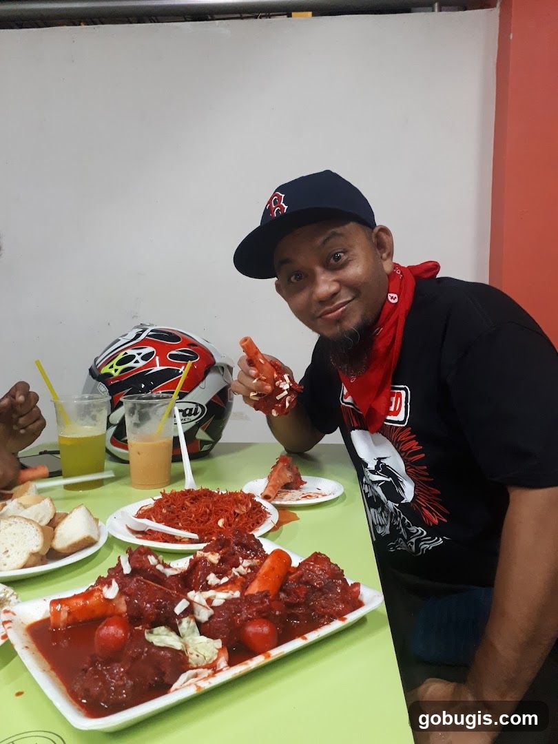 Man Eating Meat Dish