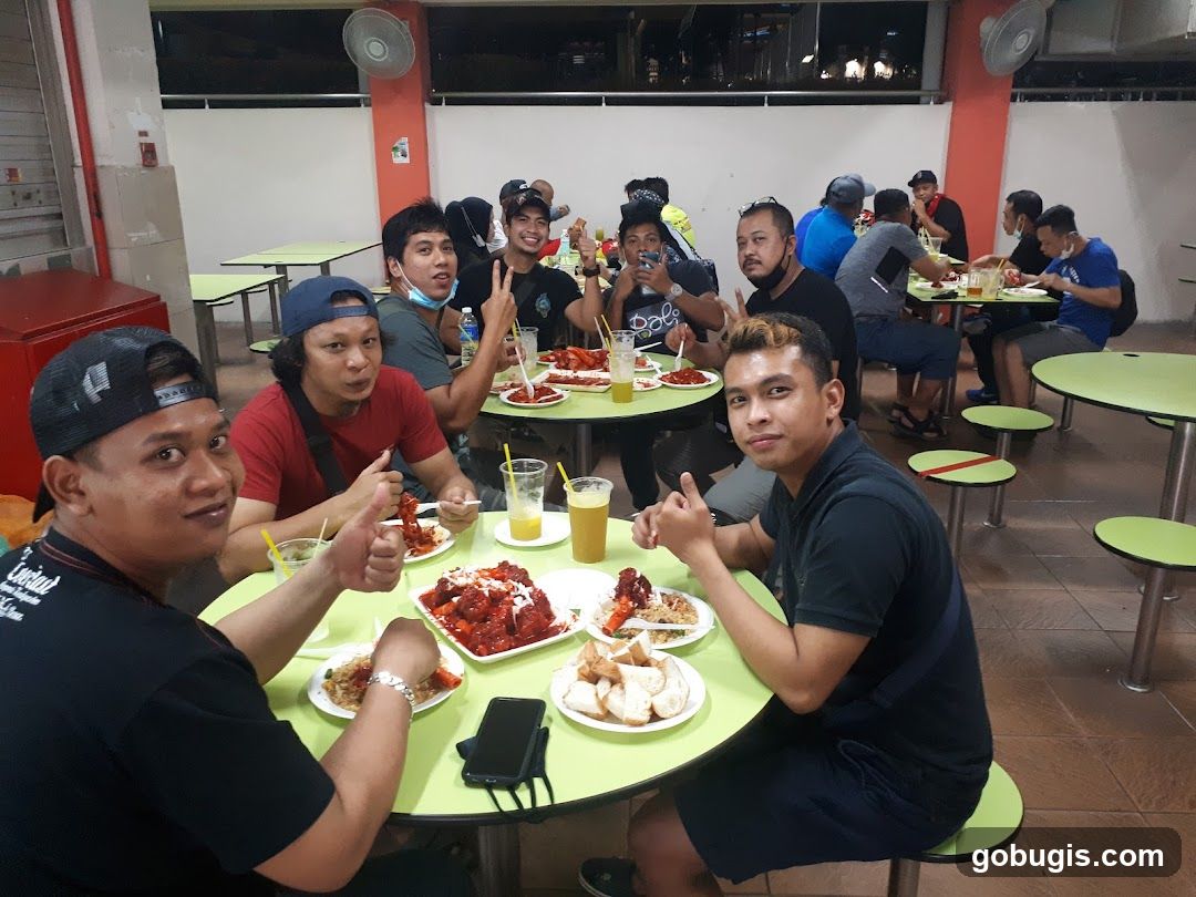 Group of people eating at a food court