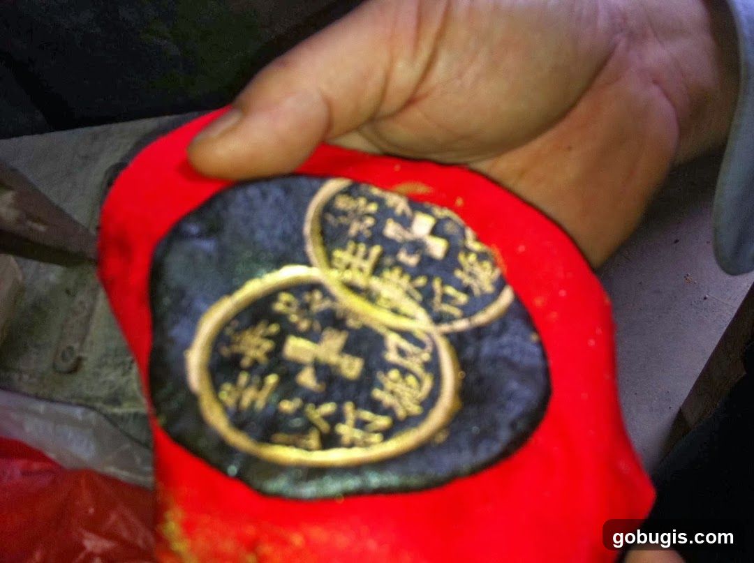 Chinese Coins on Red Fabric