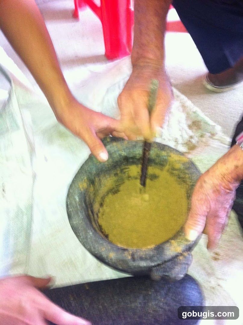 Grinding ingredients in a mortar and pestle