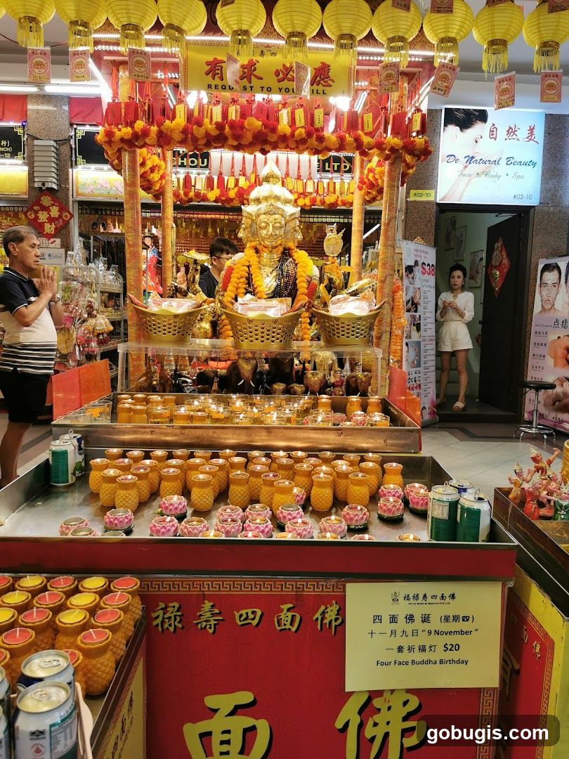 Buddhist Altar with Candles and Offerings