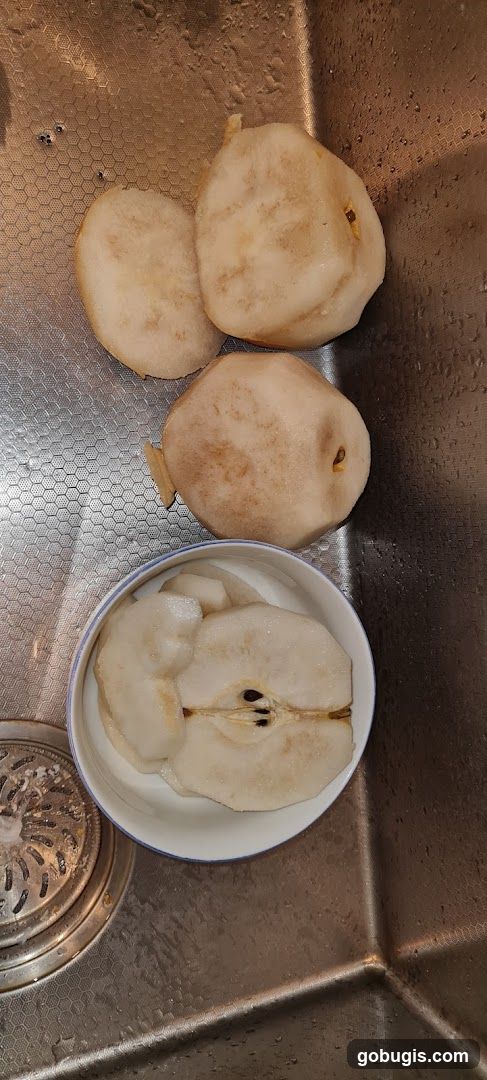 Peeled Pears in Sink