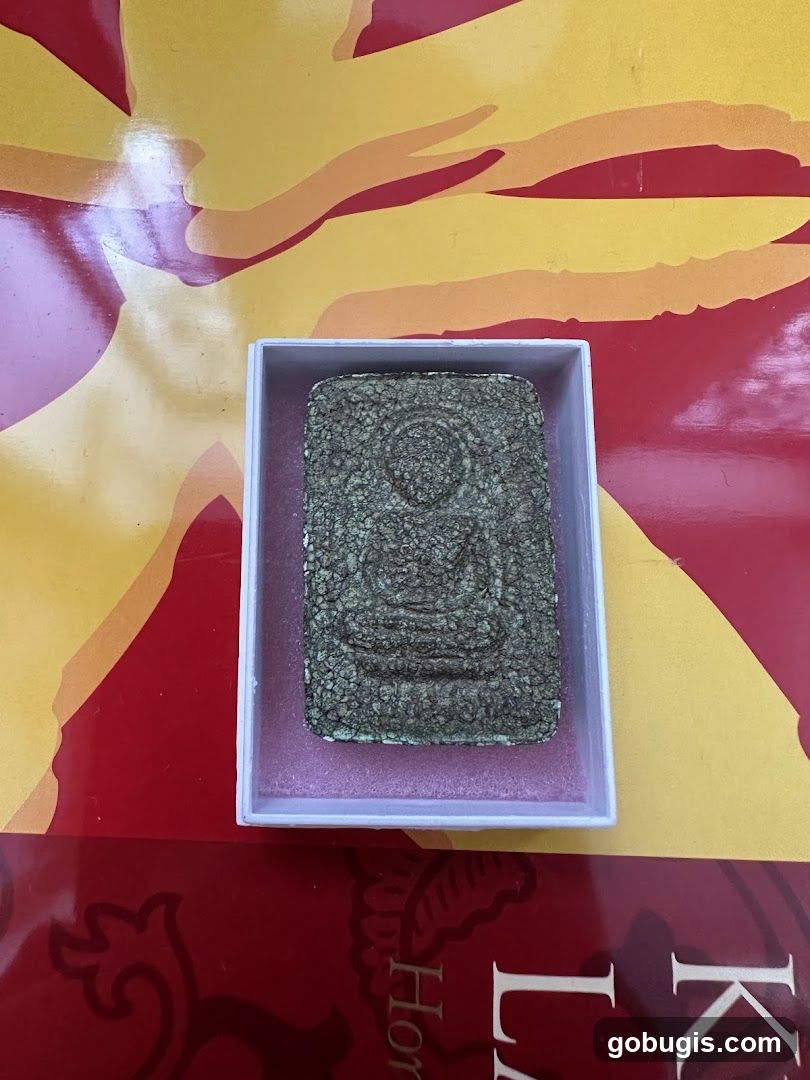 Buddha amulet in a box