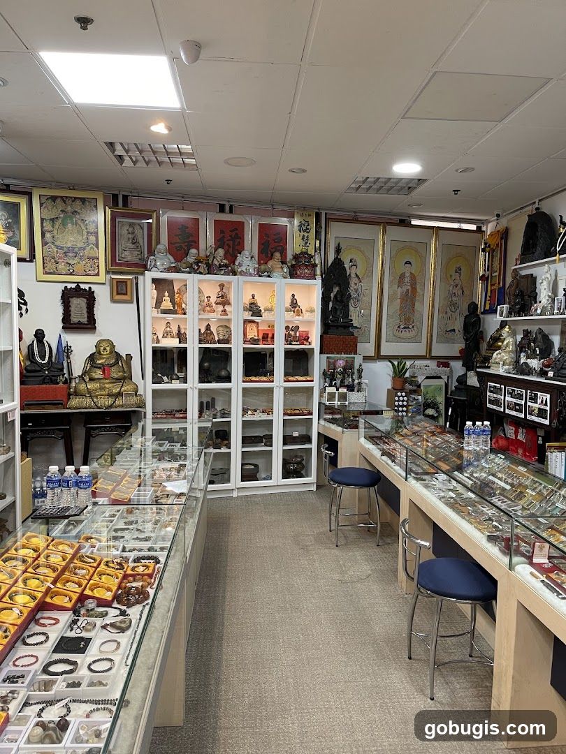 Interior of a shop with Buddhist statues and jewelry