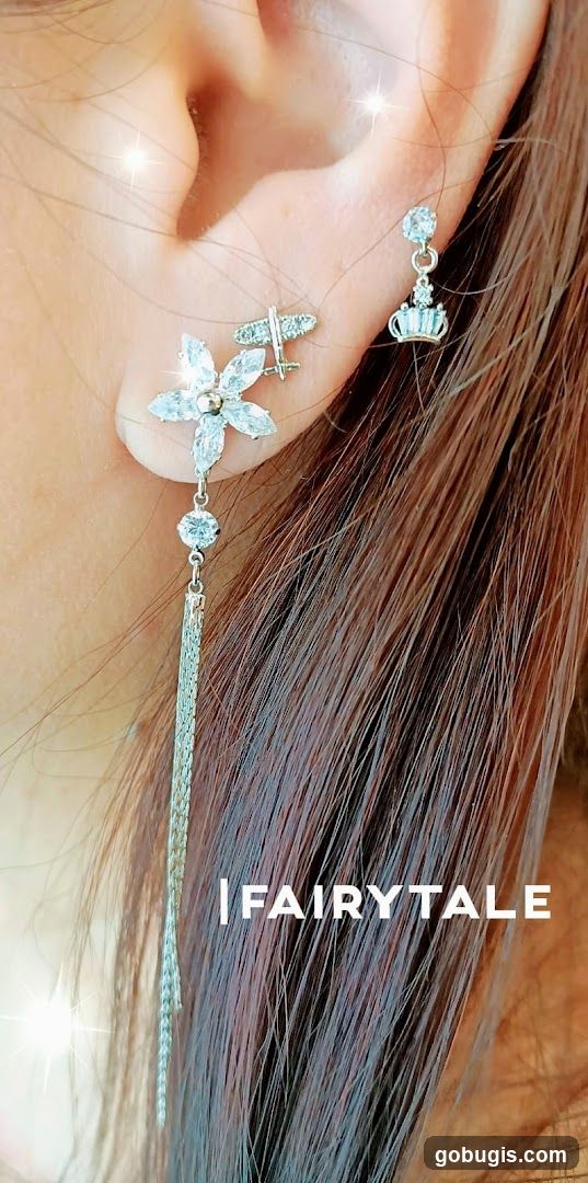 Earrings with Flower and Crown Motifs