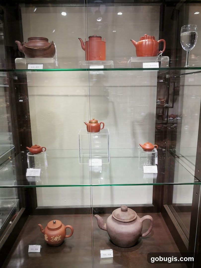 Display Case with Teapots
