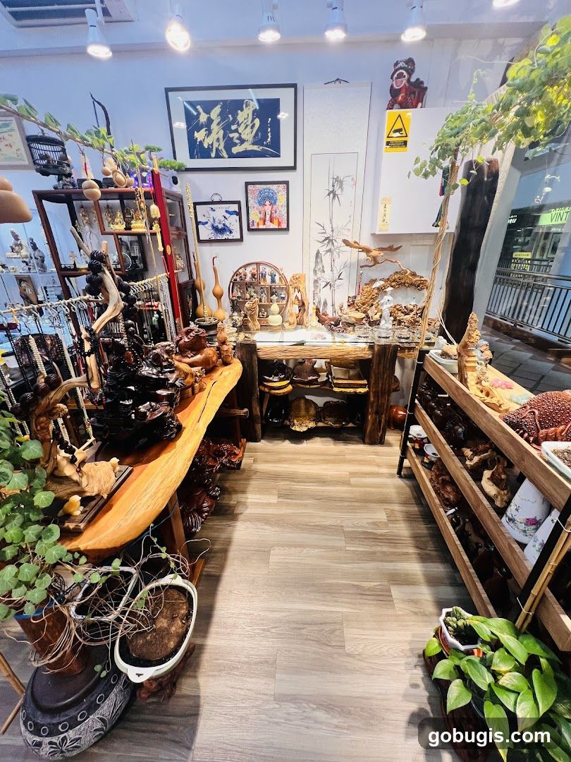 Interior of a shop with wooden carvings and art