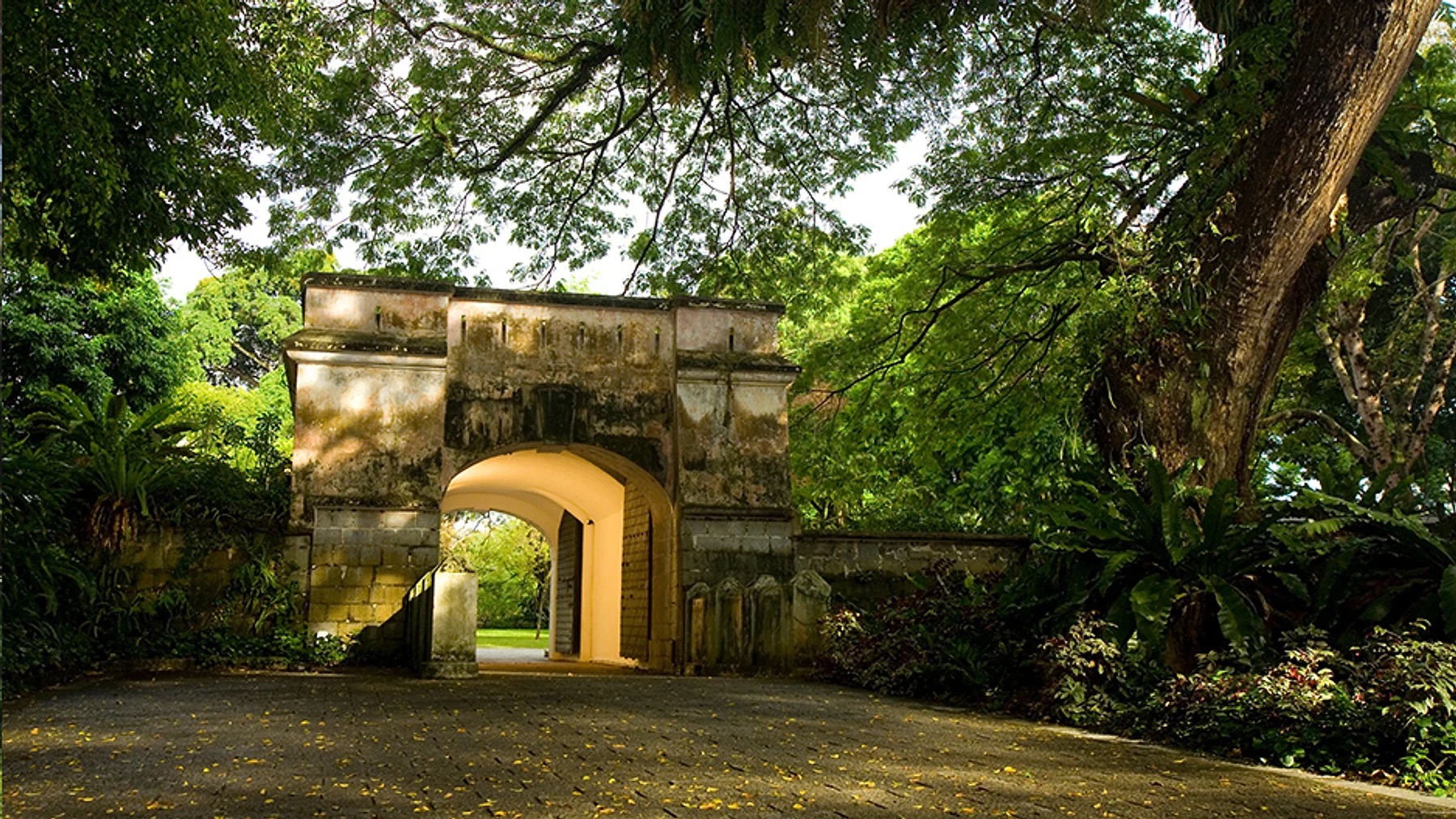Nineteenth-century Fort Gate on the path into Fort Canning Park, the hill that holds Fort Canning Green