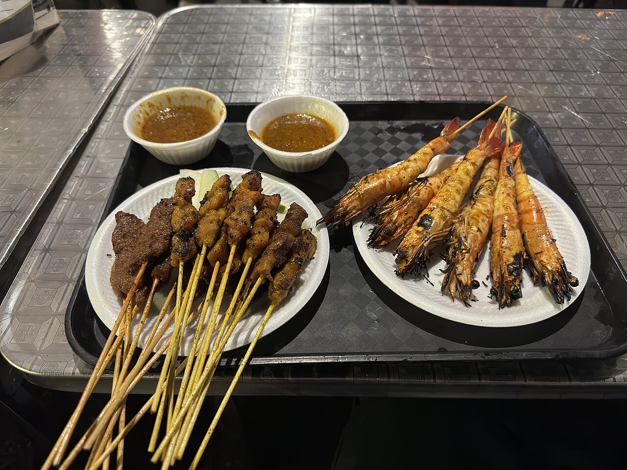 Satay and shrimp dishes at Lau Pa Sat food centre